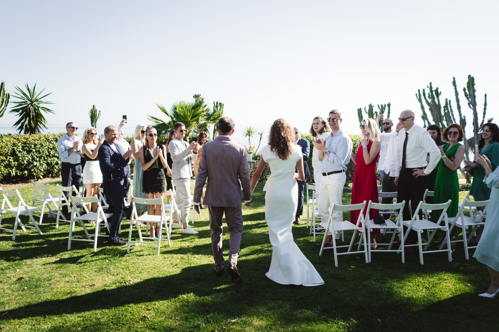 Wedding photography in Fuengirola - beachfront light and open-sky moments