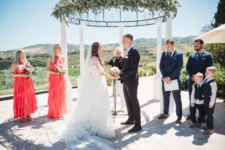 Bride and groom embracing in the olive groves at Cortijo Bravo in Málaga
